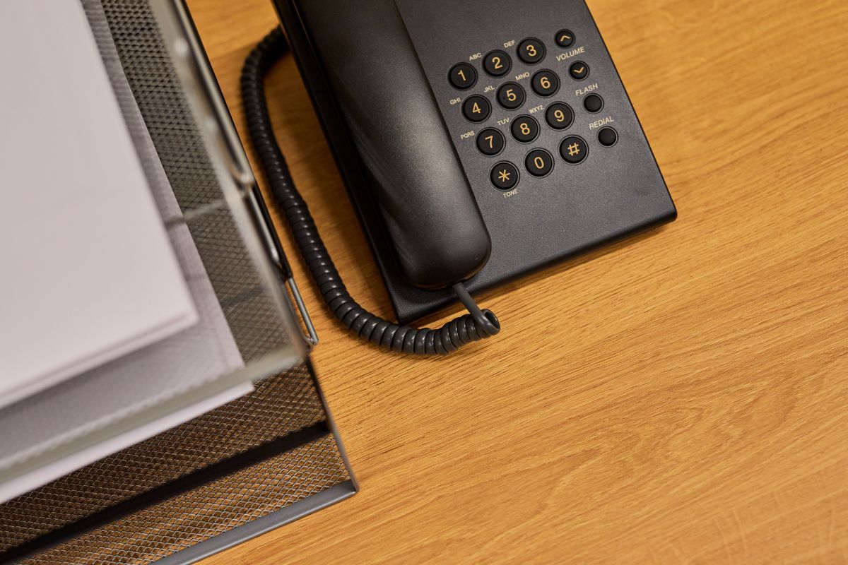 Unanswered phone at a busy dental front desk