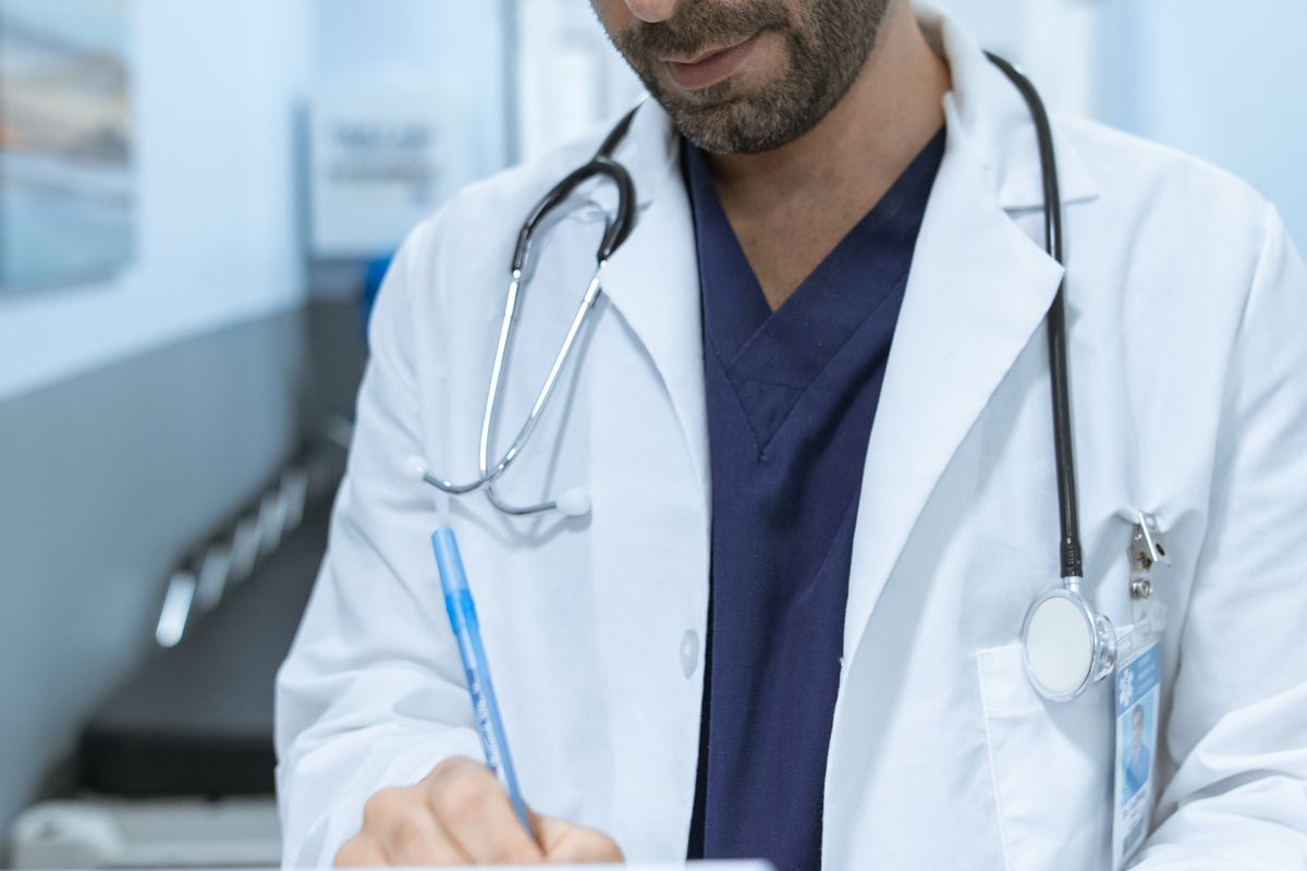 Dental charting assistant completing clinical documentation